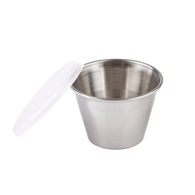 A small TableCraft stainless steel ramekin is shown with a white plastic lid resting beside it. The 2-1/2 oz ramekin has a brushed metal finish and a wide opening, with both items set against a plain white background.