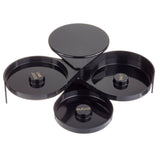 A sleek, glossy TableCraft glass rimmer featuring three circular trays labeled LIME JUICE, SALT, and SUGAR in gold text. The black, tiered design fans out for easy cocktail prep and is conveniently dishwasher safe.