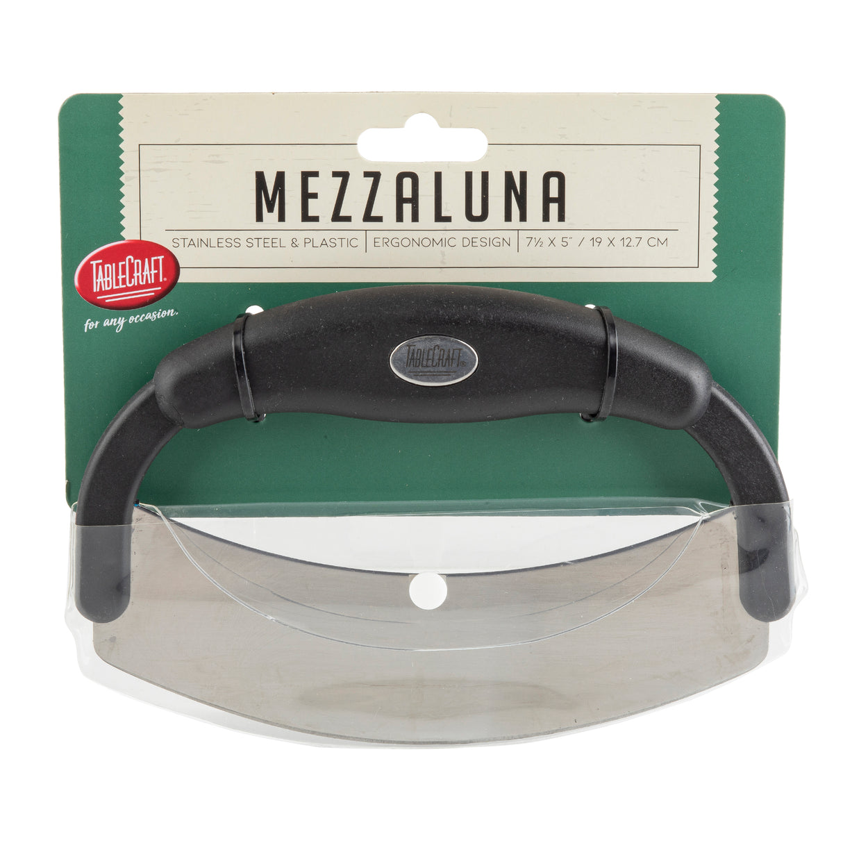 A handheld mezzaluna food cutter with a curved stainless steel blade and black plastic handle, displayed in packaging labeled “MEZZALUNA.” The ergonomic design measures 7.5 x 5 x 1.27 cm. Brand: TableCraft.
