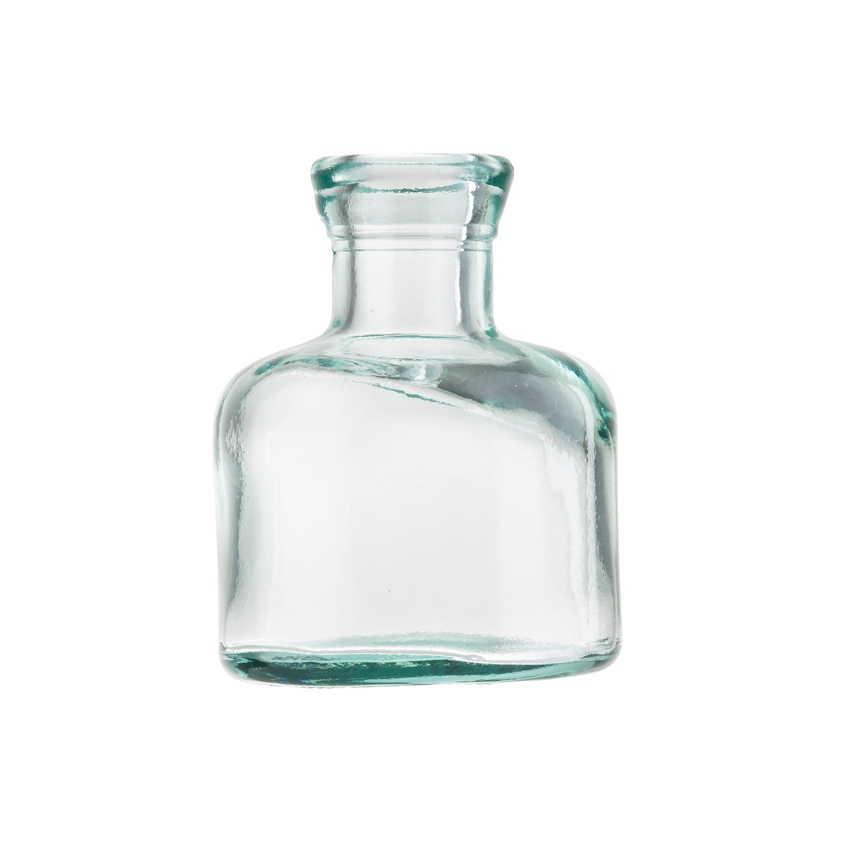 A small, clear glass bottle with a short neck and wide body is shown against a white background. Made from recycled glass, the bottle features a slightly greenish tint and is free of labels or markings—perfect for use as vases or simple decor.