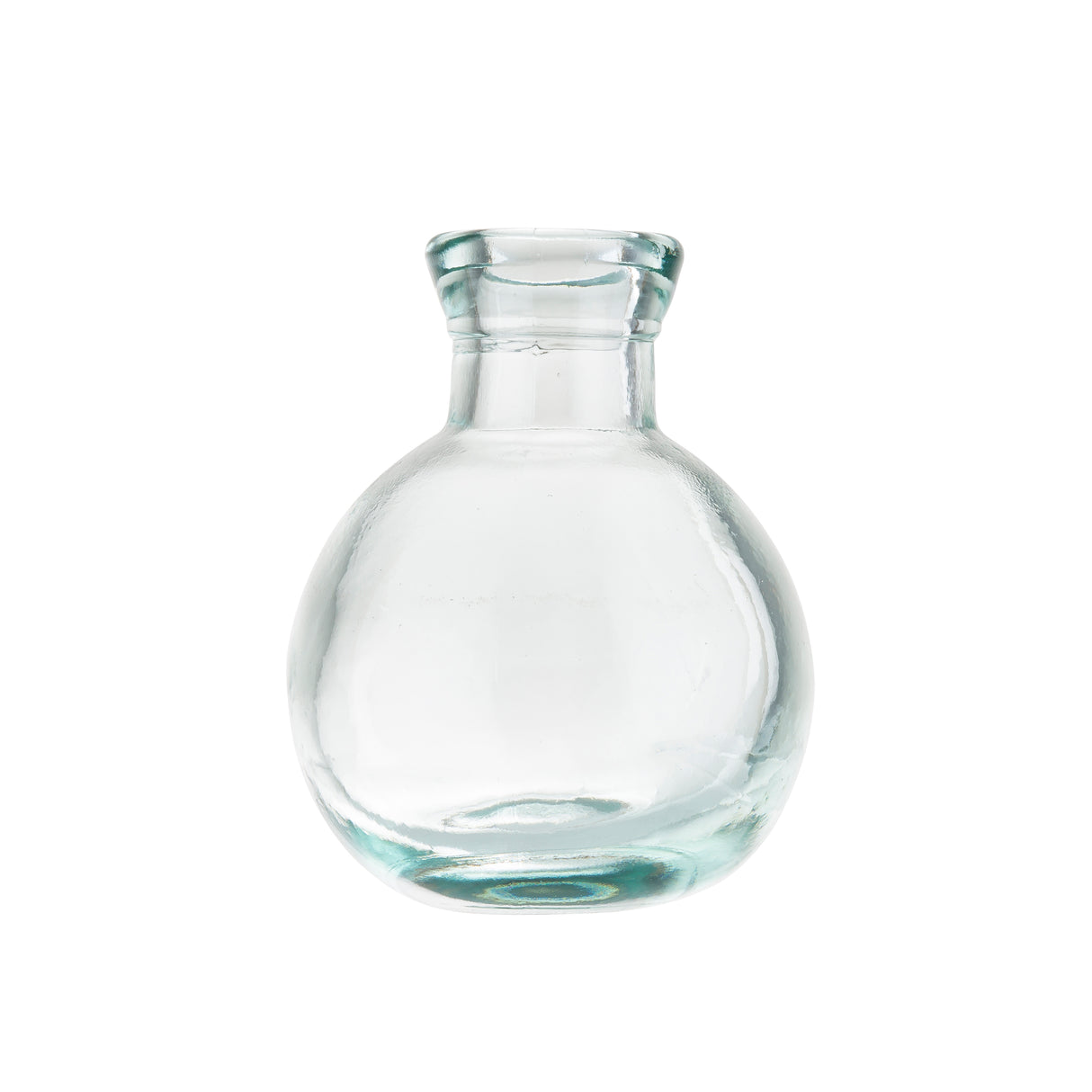 A clear, round-bottomed glass bottle with a short, wide neck and a slightly flared rim. Made from recycled glass, it is smooth, transparent with a subtle bluish tint. The empty bottle is photographed against a plain white background.
