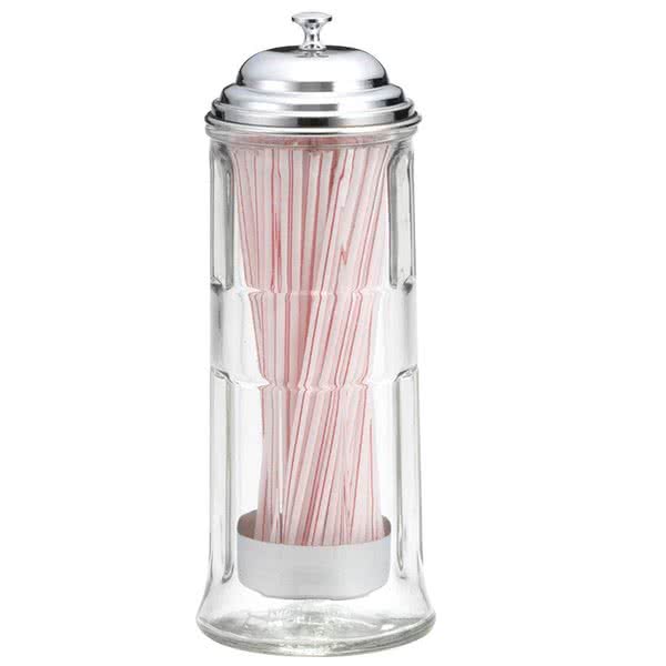 A clear TableCraft glass straw dispenser holds a bundle of white paper straws with red stripes. The cylindrical dispenser features a silver-colored metal lid with a small knob on top and subtle contours.