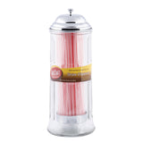 A clear TableCraft glass straw dispenser with a shiny silver lid is filled with pink and white striped straws. A yellow and brown label on the front reads Old Fashioned Soda Fountain Straw Dispenser, standing out against the white background.