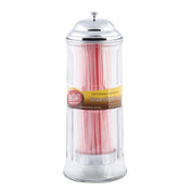 A clear TableCraft glass straw dispenser with a shiny silver lid is filled with pink and white striped straws. A yellow and brown label on the front reads Old Fashioned Soda Fountain Straw Dispenser, standing out against the white background.