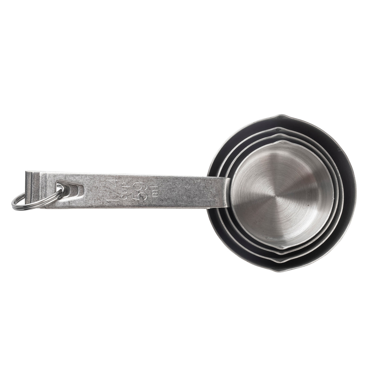 A stainless steel measuring cup set of four nests together on a white background. Held by a metal ring, each cup features etched measurement markings on the handles and is conveniently dishwasher safe.