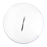 A round, transparent glass pot lid with a stainless steel handle is shown from above on a white background. The lid is clean and simple, with a slight reflection visible on its surface. It is also dishwasher safe for easy cleaning.