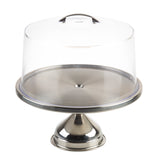 A shiny stainless steel cake stand with a wide base, topped by a clear, round cake stand cover with a handle on top. The stand is empty and displayed against a plain white background.