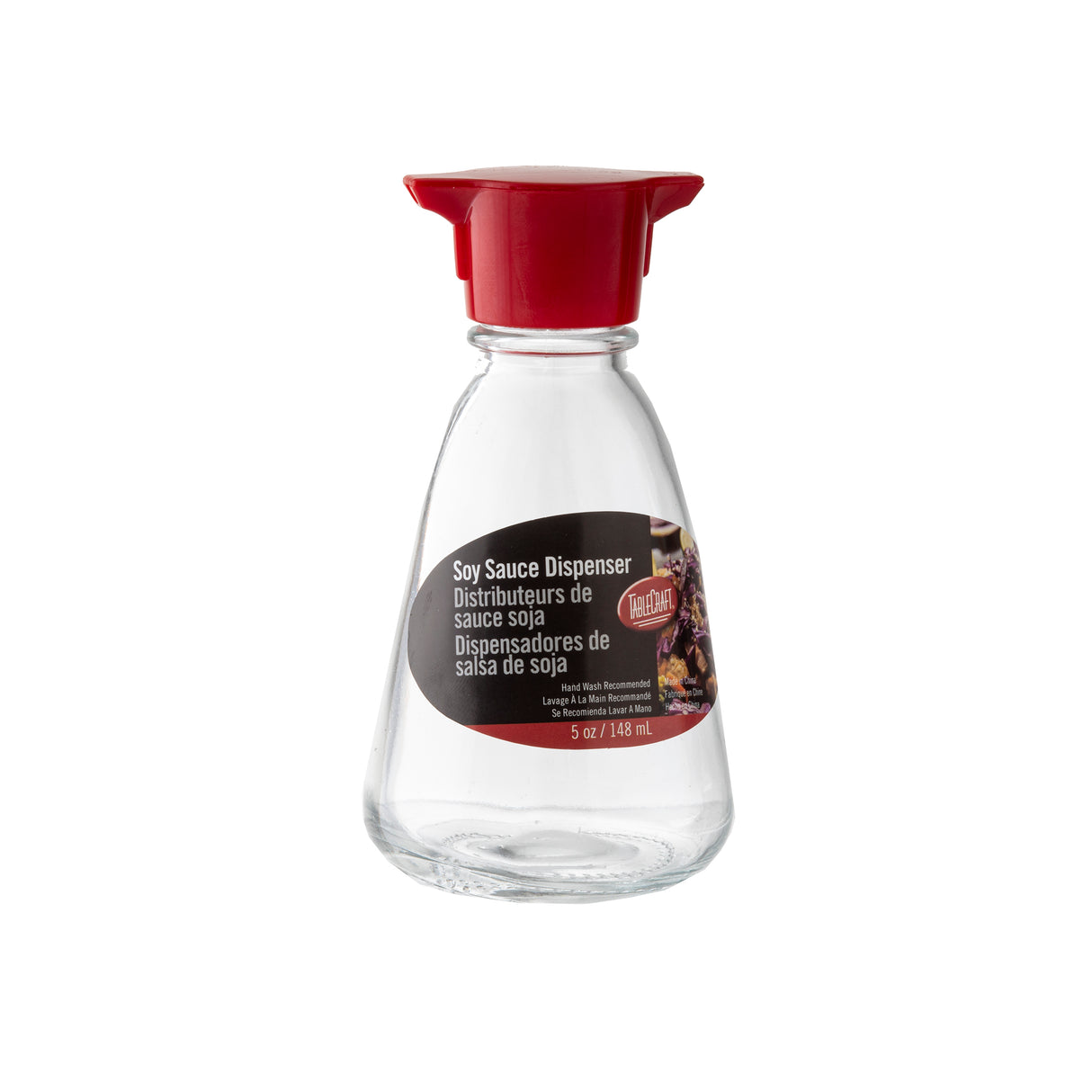 The TableCraft glass soy sauce dispenser features a red plastic cap and spout. Its label—marked in English, French, and Spanish—shows a small food image and notes a 5 oz (148 ml) capacity. Perfect as an elegant soy sauce bottle for the table.