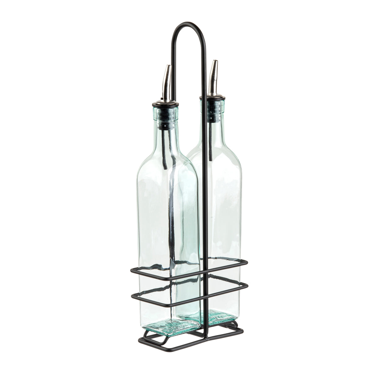 Two clear glass bottles with stainless steel pourers are held upright in a black metal wire holder with a handle. The holder’s rectangular base and grid-like sides keep the bottles secure and organized. The bottles are empty and have a slight blue tint.