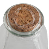 Close-up view of the neck of a clear Glass Milk Jar sealed with a cork stopper. The cork is covered with a thin layer of plastic wrap for extra protection, while the plain white background highlights this classic TableCraft design.