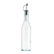 A clear, green tinted glass bottle 17 oz with a slender neck and tapered body, topped with a stainless steel pourer featuring a black rubber stopper and small flip-top cap, isolated on a white background.