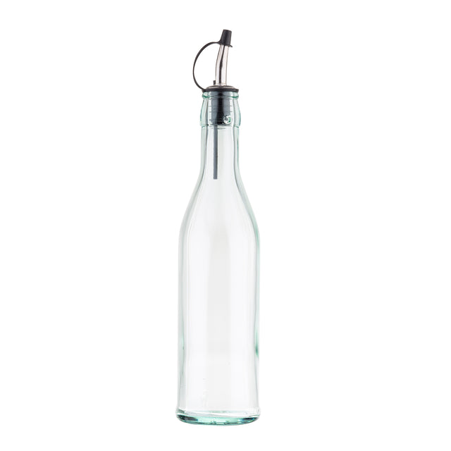 A clear, green tinted glass bottle 17 oz with a slender neck and tapered body, topped with a stainless steel pourer featuring a black rubber stopper and small flip-top cap, isolated on a white background.