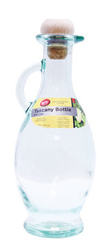 A clear green tint glass bottle with a handle and round cork stopper. The yellow label reads “Tuscany Bottle with Cork,” displays capacity, and features an image of olives and leaves—perfect as an olive oil bottle for your kitchen.