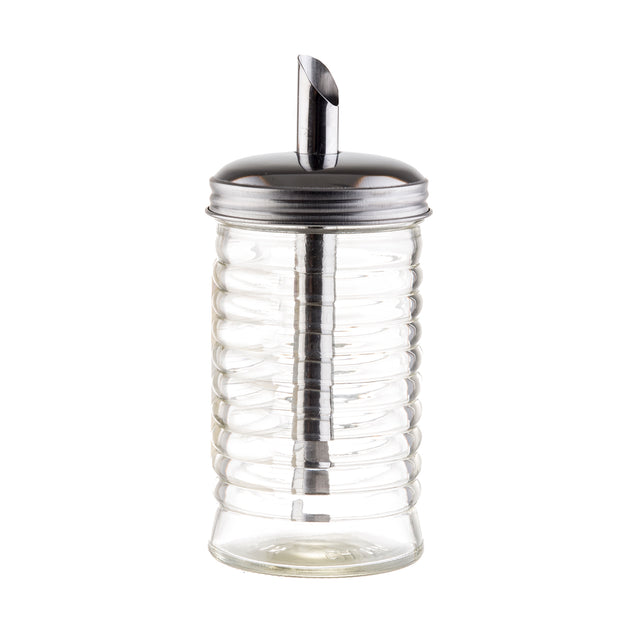 A clear ribbed glass sugar pourer from the Beehive Collection features a stainless steel pour spout and metal lid, perfect for precise pouring; the empty container is photographed on a white background.
