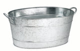 A shiny, oval-shaped TableCraft beverage tub made of galvanized steel with two side handles is shown against a plain white background. The tub features a slightly textured surface and horizontal raised bands for reinforcement.