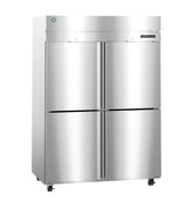 A large, stainless steel reach-in commercial refrigerator with four doors, two on top and two on the bottom, sits on small wheels. The metallic surface is reflective, with a digital control panel and a manufacturer logo near the top left corner.