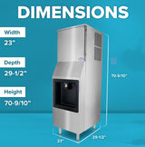A stainless steel hotel ice machine is shown against a blue background. White text labels its dimensions: width 23, depth 29-1/2, and height 70-9/10. Dimension lines highlight each side of the full cube ice dispenser.