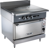 A heavy duty range, the Vulcan V1FT36S features a commercial stainless steel French top with three control knobs, a flat cooking surface, an oven below, adjustable legs, a backsplash, and the distinctive Vulcan logo on the oven door handle.