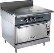 A heavy duty range, the Vulcan V1FT36S features a commercial stainless steel French top with three control knobs, a flat cooking surface, an oven below, adjustable legs, a backsplash, and the distinctive Vulcan logo on the oven door handle.