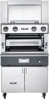 A large, stainless steel Vulcan V Series heavy duty broiler with an open grilling compartment, knobs on both sides, storage cabinet below, and four wheels. The modern, industrial grill features the Vulcan logo displayed in two places.