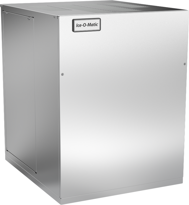 A stainless steel Ice-O-Matic Quartz Ice® Maker with an air-cooled condenser, featuring a rectangular, boxy shape and smooth metallic finish. The machine has a logo on the upper front panel and visible seams along the edges.