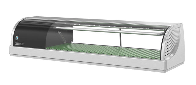 A modern, sleek Hoshizaki refrigerated sushi case with a curved glass front, green slatted base, and internal light bar. This empty countertop display case is perfect for restaurant countertops and showcases stylish stainless steel construction.