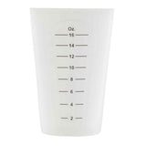 A white plastic measuring cup with black markings from 2 to 16 ounces in 2-ounce increments. Slightly transparent and dishwasher safe, it features a wide opening at the top that narrows toward the bottom.