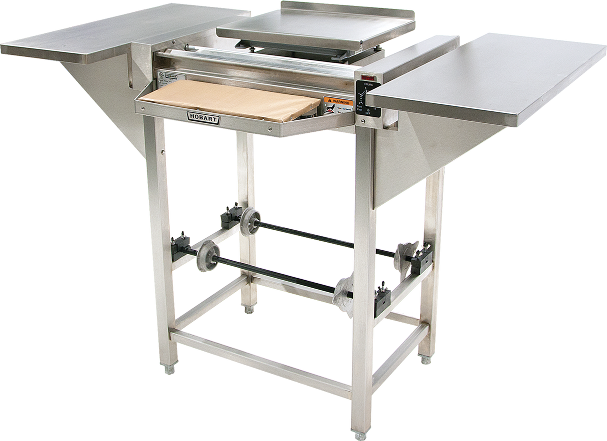 A commercial dough sheeter with stainless steel surfaces, extended side trays, adjustable rollers, and control knobs—perfect for flattening dough in bakeries or kitchens. Pairs well with a Hobart Hand Wrap Station for efficient 20 film capacity packaging.
