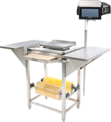 A Hobart Hand Wrap Station features a stainless steel food prep area with a digital scale and screen, two side trays, a central flat workspace, and two large rolls of 20 film capacity yellow shrink wrap stored on the rack underneath.