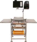 A stainless steel Energy Smart Hand Wrap Station with side trays, an overhead digital control screen, a black printer on the right, a heated seal plate, and two rolls of yellow plastic wrap stored on a rack below the main workspace.