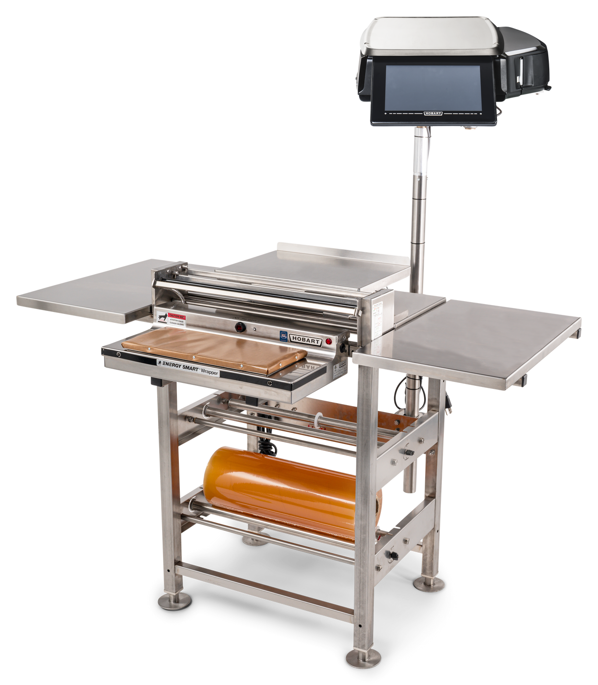 A commercial stainless steel wrapping machine with a mounted touchscreen, roll film capacity, side shelves, heated seal plate, and cutting tray. The device stands on four legs and is designed for efficient packaging of food or products.