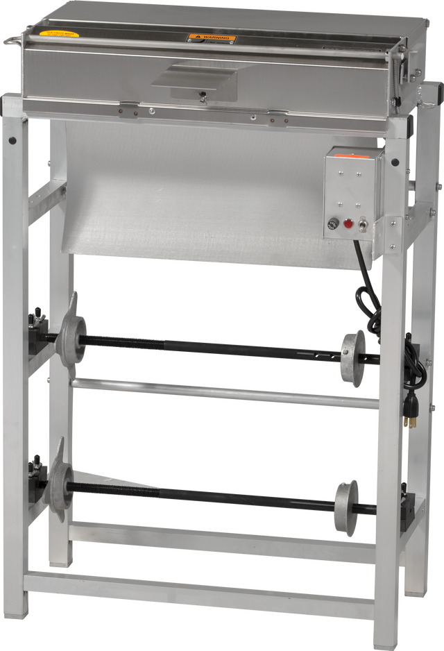 A stainless steel packaging machine with a control panel on the right side, featuring buttons and indicator lights. Includes a wrap station and two horizontal metal bars with adjustable discs, supported by a rectangular frame. Power cord visible on the right.