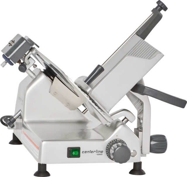 A commercial manual meat slicer made of stainless steel, shown in profile. Featuring a 12 carbon steel knife, adjustable thickness dial, green power switch, food carriage with handle, and legs for stability. The slicer is labeled “centerline.”.