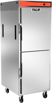 A commercial stainless steel Vulcan pass-thru mobile cabinet features two vertically stacked doors, universal tray slides, black side handles, and a red control panel on top. Four black caster wheels provide mobility. The Vulcan logo appears on the upper door.