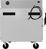 A gray stainless steel cabinet on wheels with ventilation slots, two rectangular openings, a black coiled power cord hanging from the top right, and a side handle. This industrial pass-thru mobile cabinet is shown from the side against a plain background.