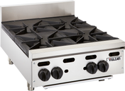 A commercial Vulcan countertop gas burner with four stainless steel burners, black cast iron grates, front control knobs, a small backsplash, and the “Vulcan” brand name displayed on the front right corner.