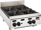 A Vulcan gas countertop hotplate featuring four large black cast iron open burners, three control knobs, and the Vulcan logo on the front right panel. The unit stands on four short metal legs and includes a raised backsplash at the back.