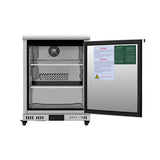 A stainless steel commercial freezer mini fridge with a glass door open to the right, revealing two adjustable shelves, a vent fan at the top, and warning and instruction labels on the inner door. The fridge sits on four small caster wheels.