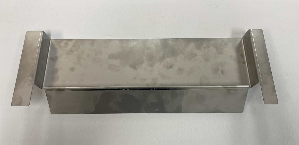A rectangular stainless steel box, likely a beverage dispenser deflector for a 22 head by Icetro America, with tall side flanges extending outward. Its mottled, reflective surface shows subtle smudges and fingerprints on a light gray background.