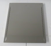 A rectangular metal sheet with a matte gray finish, featuring four small holes near each corner and two rows of elongated ventilation slits along the left and right edges, serves as a bin adapter for a 30" head on 48" bin from Icetro America.