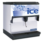 A Scotsman Ice Dispenser with a silver body and black trim. The front features a cup filled with ice cubes, snow, and “ice” in bold blue letters. With a 200 lb storage capacity, it's perfect for busy commercial settings. Brand logo on lower right corner.