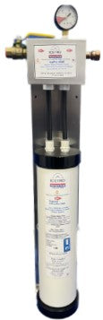 A tall, cylindrical ICEPRO 2500R water filtration system by Icetro America features a pressure gauge, input/output pipes, control box, and labels; the unit is mounted on a vertical metal bracket for easy replacement cartridge access.