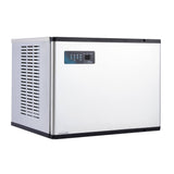 This cube-style ice maker features a metallic silver body with black trim. Its digital display and control buttons are on the front panel, while the left side sports a vented grille. This Maestro Modular Ice Maker sits against a plain white background.