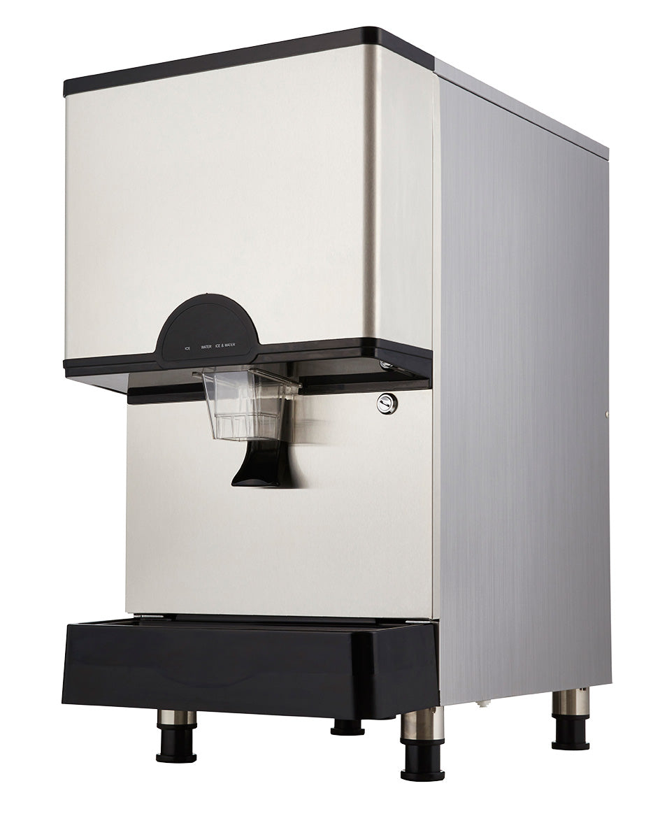 A modern, utilitarian stainless steel countertop ice & water dispenser with a black base and control panel. It features a clear plastic dispensing chute at the front and four adjustable metal legs—ideal for food service settings.