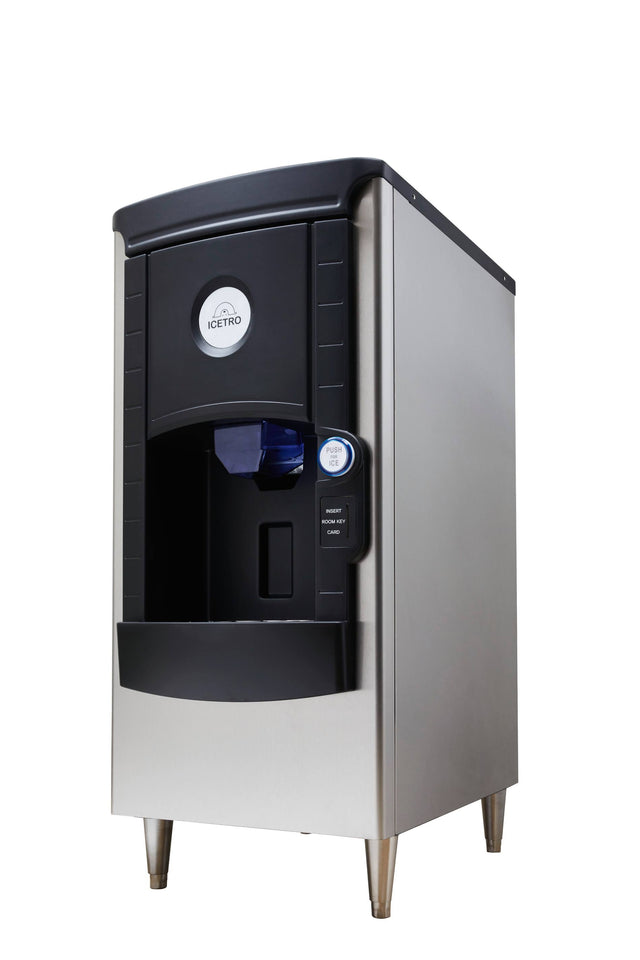 A stainless steel and black floor model ice dispenser with 141 lb ice storage, front dispensing area, control buttons, and digital display. The modern “ICETRO” hotel ice dispenser stands on four metal legs for a sleek countertop look.