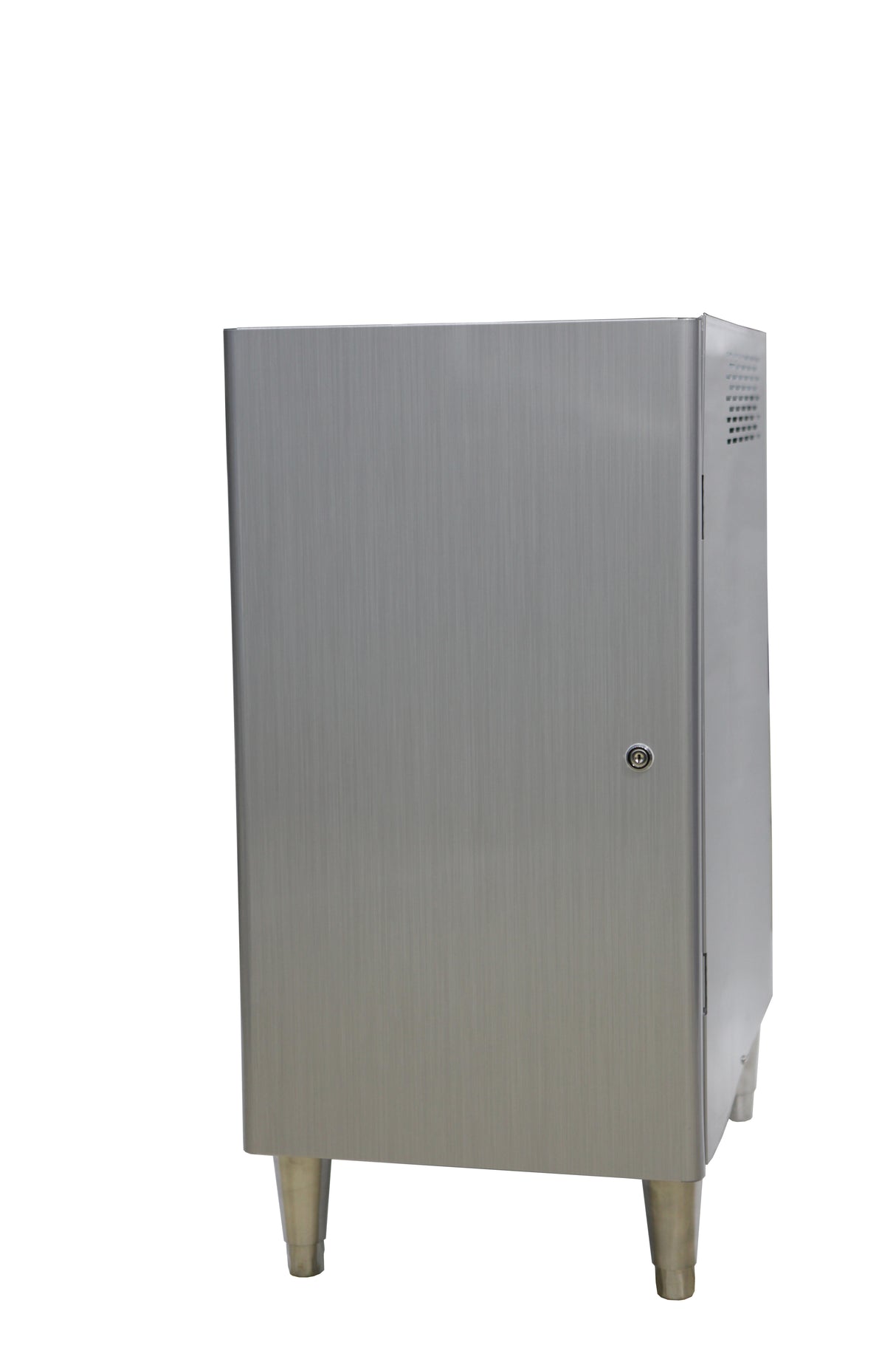 A metallic, rectangular cabinet stands on four short legs. The brushed stainless steel door has a small round lock. The background is white, highlighting the simple, industrial design with subtle vent holes on the right side.