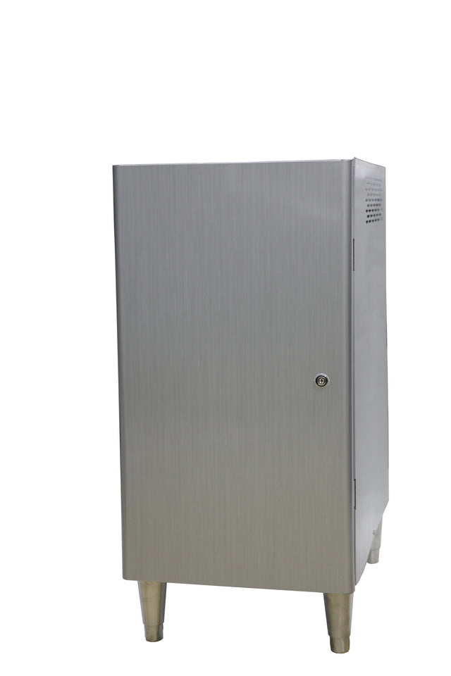A metallic, rectangular cabinet stands on four short legs. The brushed stainless steel door has a small round lock. The background is white, highlighting the simple, industrial design with subtle vent holes on the right side.