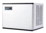 A rectangular stainless steel Icetro America modular ice maker with a black top and side vents. The front panel features a digital display and control buttons, while the right side has horizontal ventilation slits. The appliance is set against a white background.