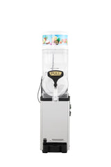A stainless steel and plastic Icetro America frozen beverage dispenser with a clear cylindrical tank, a large "PULL" lever, and fruit images on top. This slush machine stands on a black base against a white background.