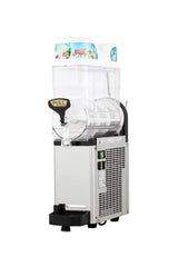 A commercial Icetro America frozen beverage dispenser with a clear cylindrical tank and "PULL" handle. The silver base features vents and a drip tray, while the top showcases colorful fruit images. Set against a completely white background.